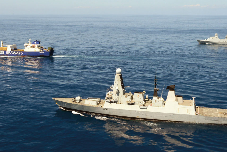 Image of HMS Diamond (foreground) and the Danish Peter Willemoes vessel (background), escorting the merchant ship Ark Futura.