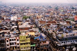 City rooftops with smoggy horizon