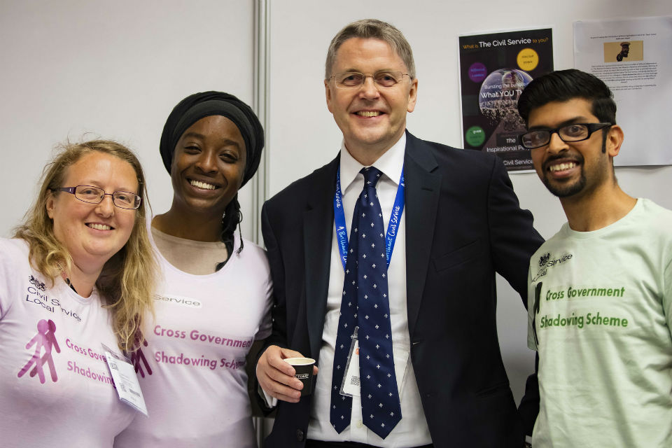 Three members of diversity scheme with head of civil service