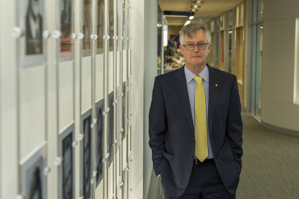 Martin Parkinson standing in an office corridor