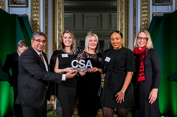 Members of the Department for Education's Care Leaver Policy Team, with their Developing People Award, and award presenter Elizabeth Gardiner, First Parliamentary Counsel